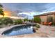 Luxury pool and spa with lounge chairs at 8260 E Sunset View Dr, Gold Canyon, AZ 85118