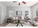 Comfortable living room with gray sofa, glass table, and neutral decor at 846 W Kroll Ave, Gilbert, AZ 85233