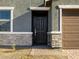 Close up of the home's entryway and two-car garage at 8636 W Warner St, Tolleson, AZ 85353