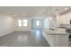 Modern kitchen with granite countertops and pendant lights at 8636 W Warner St, Tolleson, AZ 85353