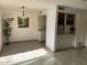 Bright dining area with tile floors and adjacent kitchen at 8861 N 12Th Pl, Phoenix, AZ 85020