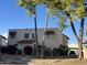 Two-story stucco building with red tile roof, landscaping, and a paved walkway at 8861 N 12Th Pl, Phoenix, AZ 85020
