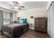 Comfortable bedroom with ceiling fan and ample closet space at 954 E Diamond Dr, Tempe, AZ 85283