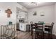 Bright dining area with table and chairs, adjacent to kitchen at 954 E Diamond Dr, Tempe, AZ 85283