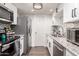 Modern kitchen with stainless steel appliances and granite countertops at 954 E Diamond Dr, Tempe, AZ 85283