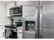 Sleek kitchen with stainless steel refrigerator and microwave at 954 E Diamond Dr, Tempe, AZ 85283