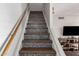 Modern stairs with wood and tile details at 954 E Diamond Dr, Tempe, AZ 85283
