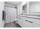 Bathroom with double vanity, granite countertop, and shower/tub combo at 10366 W Camelia Dr, Arizona City, AZ 85123