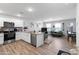 Open concept kitchen with island and granite countertops at 10366 W Camelia Dr, Arizona City, AZ 85123