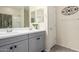 Bright bathroom featuring double sinks, modern vanity, and decorative wall art at 1081 W Brangus Way, San Tan Valley, AZ 85143