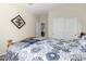 Bright bedroom with a comfortable bed, closet, and natural light at 1081 W Brangus Way, San Tan Valley, AZ 85143