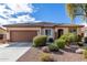 Charming single-story home featuring a well-manicured desert landscape and a brown tiled roof at 1081 W Brangus Way, San Tan Valley, AZ 85143