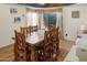 Spacious dining room featuring a large wooden table and six chairs at 1112 W Citation Dr, Chandler, AZ 85224