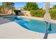 Relaxing kidney-shaped pool perfect for summer enjoyment at 1112 W Citation Dr, Chandler, AZ 85224