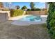 Refreshing kidney-shaped pool surrounded by lush landscaping at 1112 W Citation Dr, Chandler, AZ 85224