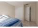 Cozy bedroom with neutral walls and a double closet for ample storage space at 11810 W Belmont Dr, Avondale, AZ 85323