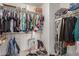 Organized walk-in closet with ample storage space for clothing and accessories at 11810 W Belmont Dr, Avondale, AZ 85323