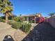 Backyard patio area with a seating area and landscaping at 12226 N Lakeforest Dr, Sun City, AZ 85351