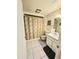 Clean bathroom with shower/tub combo and updated vanity at 12226 N Lakeforest Dr, Sun City, AZ 85351