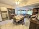 Bright dining area with table and chairs near the kitchen at 12226 N Lakeforest Dr, Sun City, AZ 85351