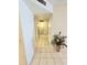 Bright hallway with tile flooring and a decorative plant at 12226 N Lakeforest Dr, Sun City, AZ 85351