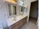 Double vanity bathroom with large mirrors at 1324 W Michigan Ave, Phoenix, AZ 85023