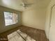 Bright bedroom with large window and carpet flooring at 1324 W Michigan Ave, Phoenix, AZ 85023