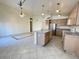 Kitchen boasts an island and ample cabinet space at 1324 W Michigan Ave, Phoenix, AZ 85023