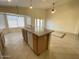 Eat-in kitchen with island and access to backyard at 1324 W Michigan Ave, Phoenix, AZ 85023