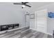 Bedroom with built-in shelving and gray laminate flooring at 14667 N Love Ct, Fountain Hills, AZ 85268