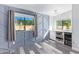 Modern dining area with geometric wall paneling and a built-in bar at 14667 N Love Ct, Fountain Hills, AZ 85268