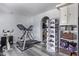 Well-equipped home gym featuring treadmill, stationary bike, and ample storage at 14667 N Love Ct, Fountain Hills, AZ 85268