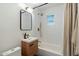 Modern bathroom with a soaking tub and updated fixtures at 1510 E Mission Ln, Phoenix, AZ 85020