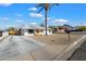 Newly remodeled home with a clean, modern design and driveway at 1510 E Mission Ln, Phoenix, AZ 85020