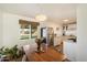 Modern kitchen with stainless steel appliances and wooden dining table at 1510 E Mission Ln, Phoenix, AZ 85020