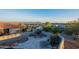 Landscaped backyard with patio and mountain views at 15302 E Lotus Ln, Fountain Hills, AZ 85268