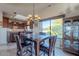 Bright dining area with a wooden table and kitchen views at 15302 E Lotus Ln, Fountain Hills, AZ 85268