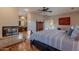 Main bedroom with fireplace and ensuite bathroom access at 15302 E Lotus Ln, Fountain Hills, AZ 85268