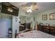 Bedroom with a large bed, dresser, and ceiling fan at 1555 W 7Th Pl, Mesa, AZ 85201