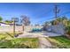 Concrete patio with seating area and basketball hoop at 1555 W 7Th Pl, Mesa, AZ 85201