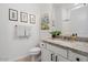 Elegant powder room with granite countertop and single sink vanity at 15550 S 5Th Ave # 240, Phoenix, AZ 85045