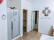 Bathroom with shower, closet, and tile floors at 16846 W Hilton Ave, Goodyear, AZ 85338