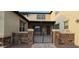 Charming courtyard entrance with stone accents and iron gates at 16846 W Hilton Ave, Goodyear, AZ 85338