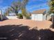 Large backyard with gravel, shed and trees at 1714 N Pleasant Dr, Chandler, AZ 85225