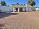 Large backyard with gravel and a storage shed at 1714 N Pleasant Dr, Chandler, AZ 85225