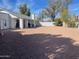 Large backyard with gravel and fenced perimeter at 1714 N Pleasant Dr, Chandler, AZ 85225