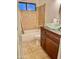 Clean bathroom with updated vanity and bathtub shower combo at 1714 N Pleasant Dr, Chandler, AZ 85225