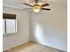 Well-lit bedroom with tile floors and a window at 1714 N Pleasant Dr, Chandler, AZ 85225