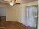 Spacious dining area featuring wood floors and natural light at 1714 N Pleasant Dr, Chandler, AZ 85225