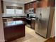 Well-equipped kitchen featuring stainless steel appliances at 1714 N Pleasant Dr, Chandler, AZ 85225